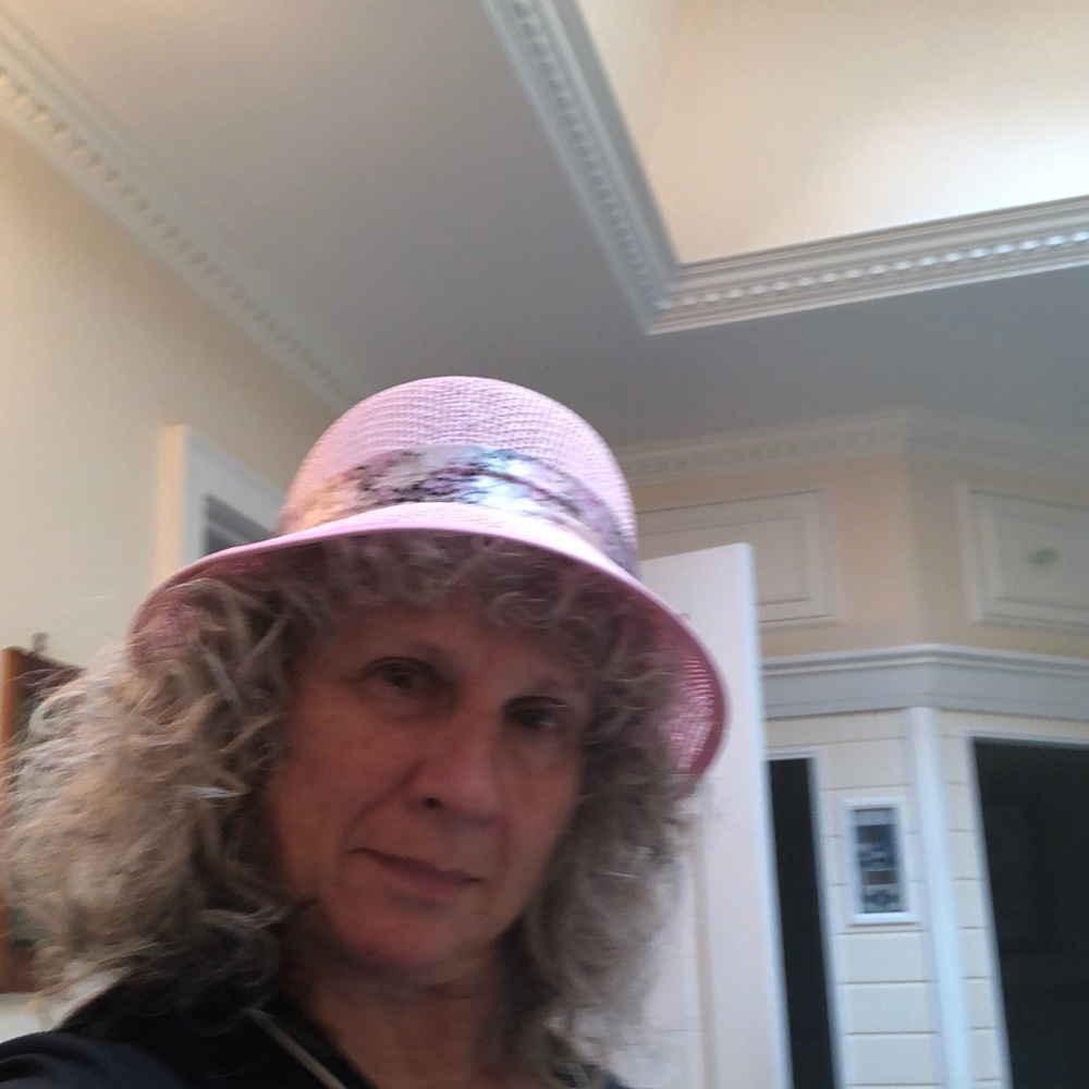 Super cute pink hat with floral ribbon